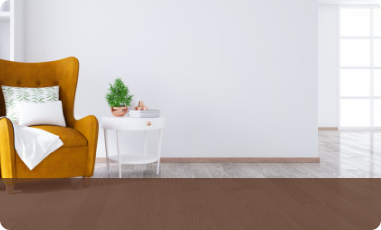 Bright white room with a mustard armchair